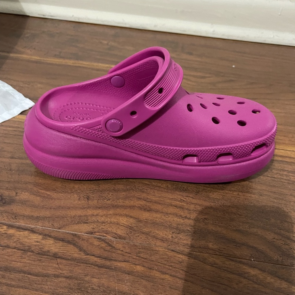 Crocs pink platform crush clogs size 7. Yellow pair is SOLD.